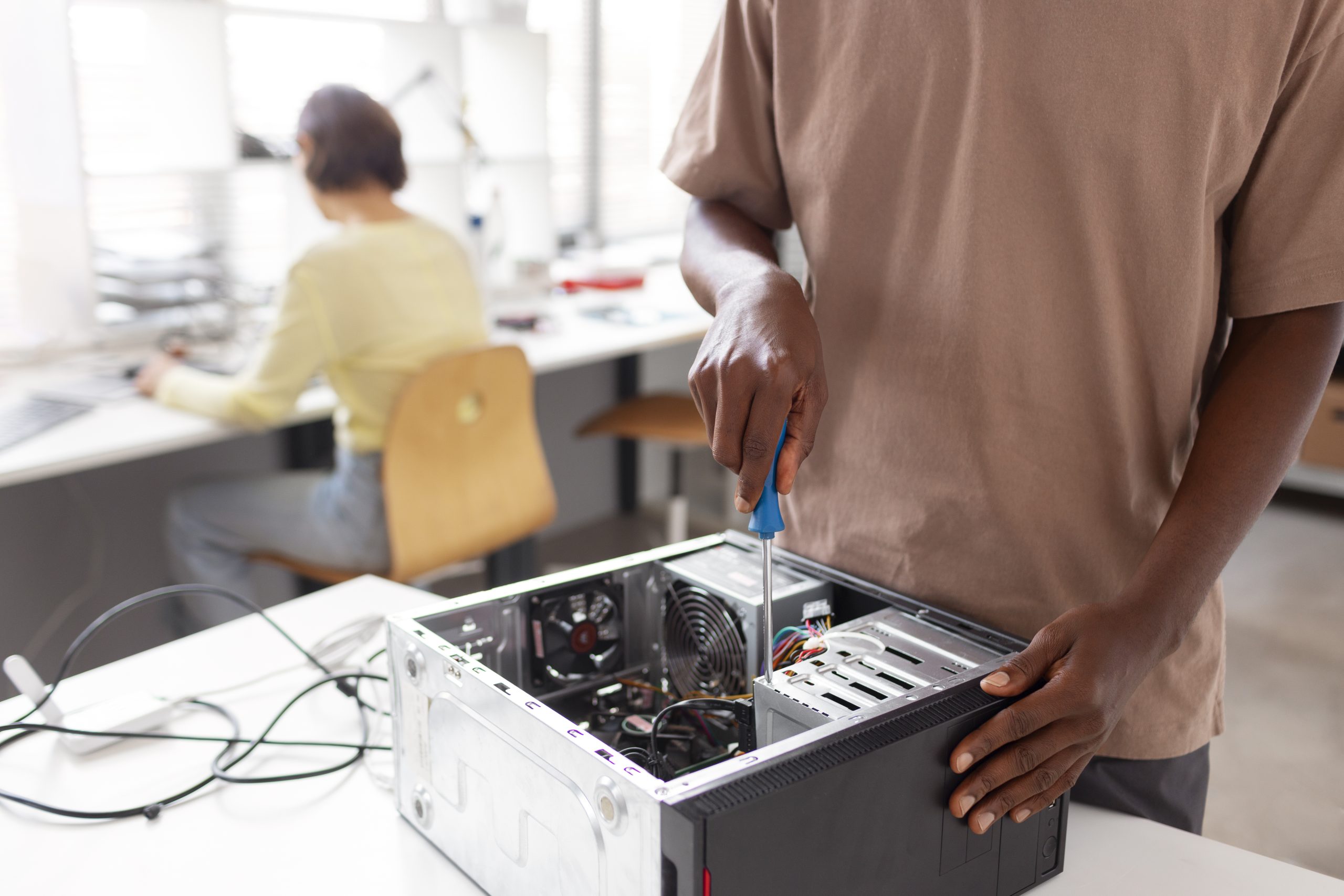 people-repairing-computer-chips